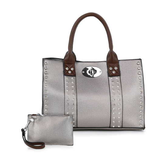 The Accessorized Twist-Lock Handbag features metallic silver faux leather, brown handles, silver studs, a metal twist-lock clasp, and includes a matching silver zippered pouch attached by a small strap.