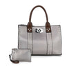 The Accessorized Twist-Lock Handbag features metallic silver faux leather, brown handles, silver studs, a metal twist-lock clasp, and includes a matching silver zippered pouch attached by a small strap.