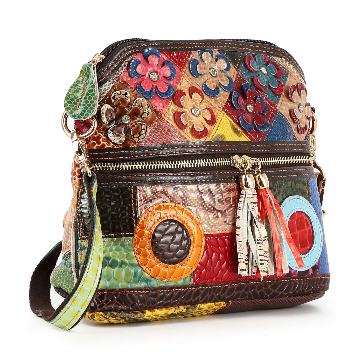The Genuine Leather Colorful Crossbody Sling features a textured patchwork design with floral and circular appliqués, zippered front pocket, decorative tassels, and an adjustable multicolored strap for versatile carrying.