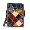 The Genuine Leather Colorful Petite Crossbody Sling features a patchwork design in navy, yellow, red, white, purple, and brown squares with a shiny blue flap, brown trim, gold clasp and hardware. Includes an adjustable strap for versatile wear.