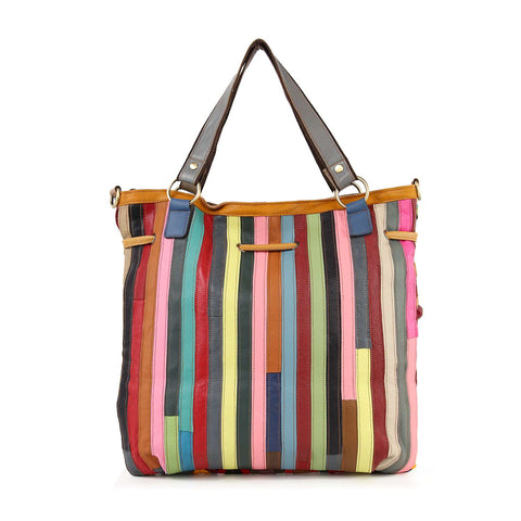 The Genuine Leather Oversized Tote Handbag features vertical strips in red, blue, green, pink, yellow, and brown, two brown handles, gold hardware, and a spacious silhouette thats perfect for all your essentials.