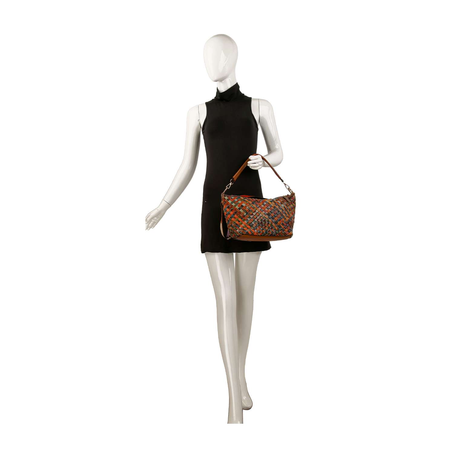 A faceless mannequin in a sleeveless black mini dress poses while holding the Genuine Leather Woven Shoulder Bag, featuring brown straps and gold-toned hardware, in its left hand.