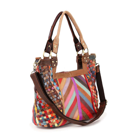 The Genuine Leather Colorful Woven Shoulder Bag features woven multicolored side squares, diagonal center stripes, brown handles, gold-tone hardware, and a removable strap—making it the ideal everyday accessory.