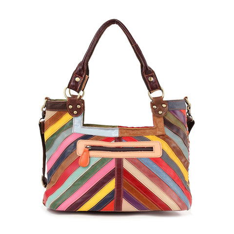 The Genuine Leather Colorful Woven Shoulder Bag features diagonal multicolored stripes, dark brown handles, gold-toned hardware, and a front zip pocket with a light orange zipper pull.