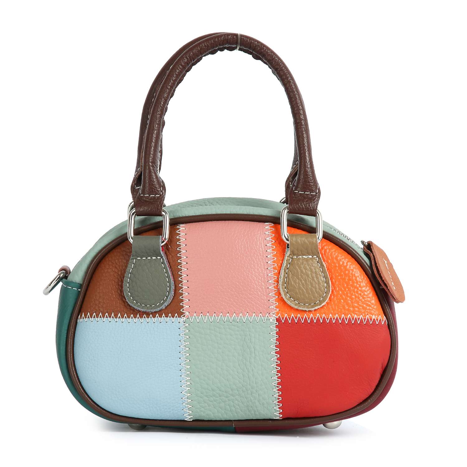 The Genuine Leather Color Block Hand Tote is a petite, rounded handbag with patchwork squares in green, pink, orange, blue, red, and brown. It features bold white zigzag stitching and two dark brown handles for a playful look.