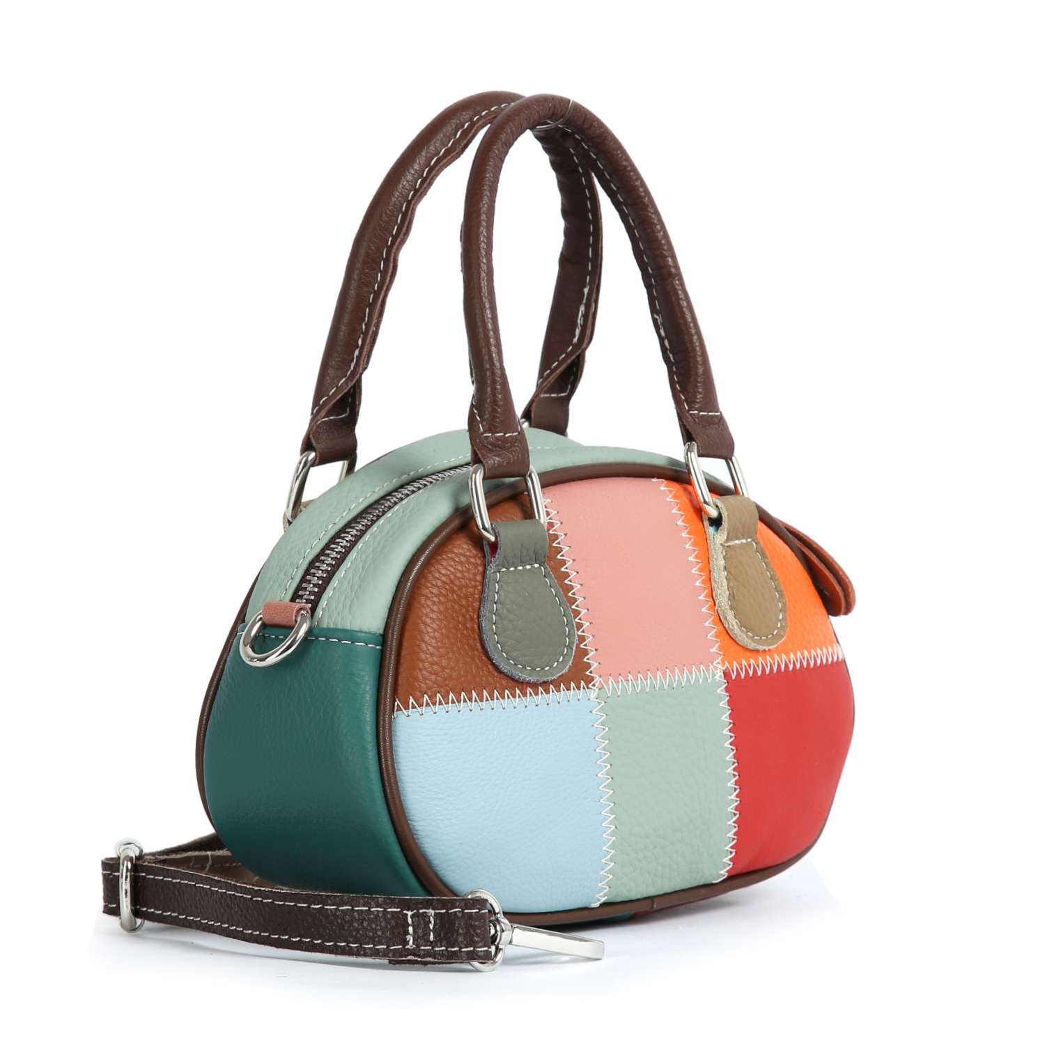 The Genuine Leather Color Block Hand Tote is a petite, dome-shaped bag with teal, light blue, brown, orange, and red patchwork panels. It features two brown handles, a detachable strap, and visible white stitching along the seams.