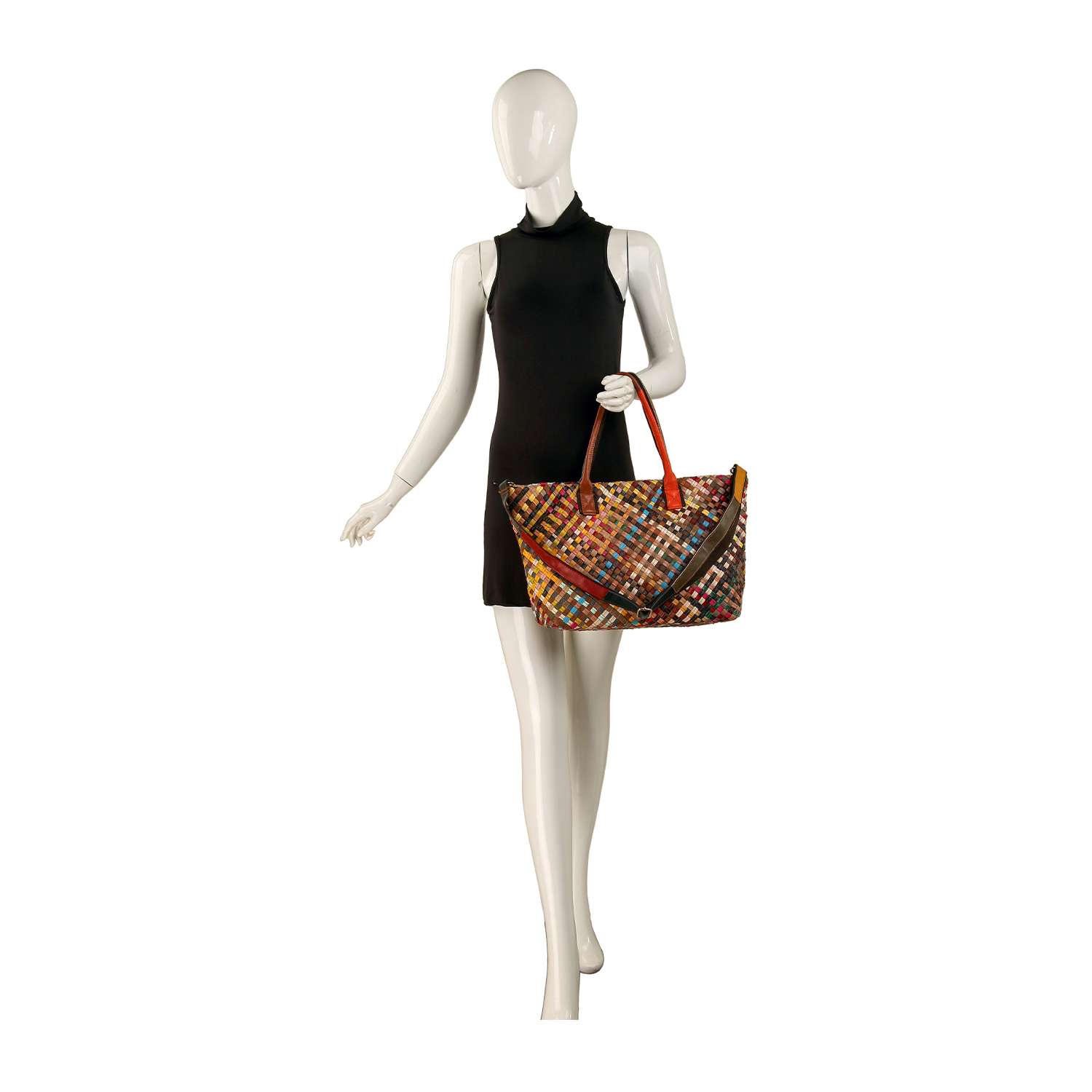 A mannequin in a sleeveless black dress holds the Genuine Leather Woven Large Tote Handbag, featuring orange double handles and gold-toned hardware, against a plain white background.