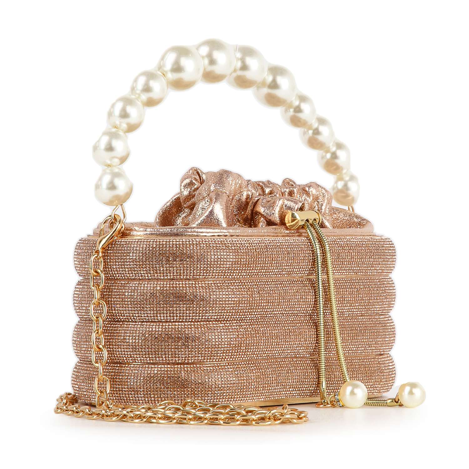 The Pearl Accented Striped Rhinestone Evening Bag is a rose-gold petite tote with a pearl handle, gold chain strap, and decorative drawstring with pearl tips—featuring a ridged, sparkling design for elegant evening style.