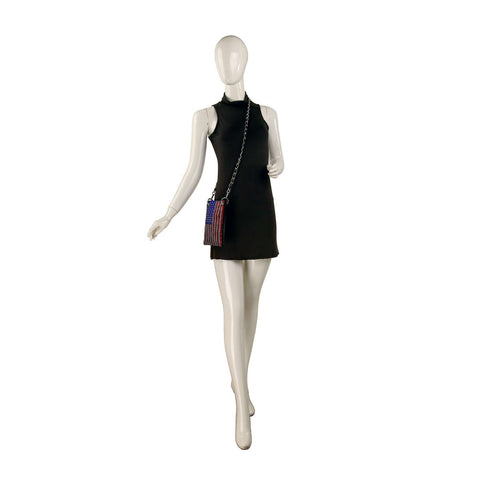 A white mannequin wears a sleeveless short black dress and the *New Size* American Flag Petite Crossbody Sling, against a plain white background.