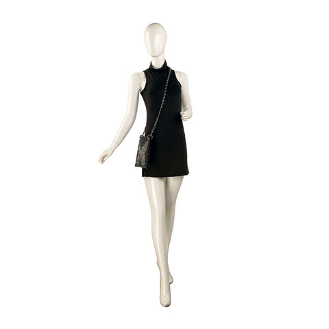 A mannequin wears a sleeveless black mini dress and the *New Size* Butterfly Design Petite Rhinestone Sling, a small phone bag with chain strap, posed against a plain white background.