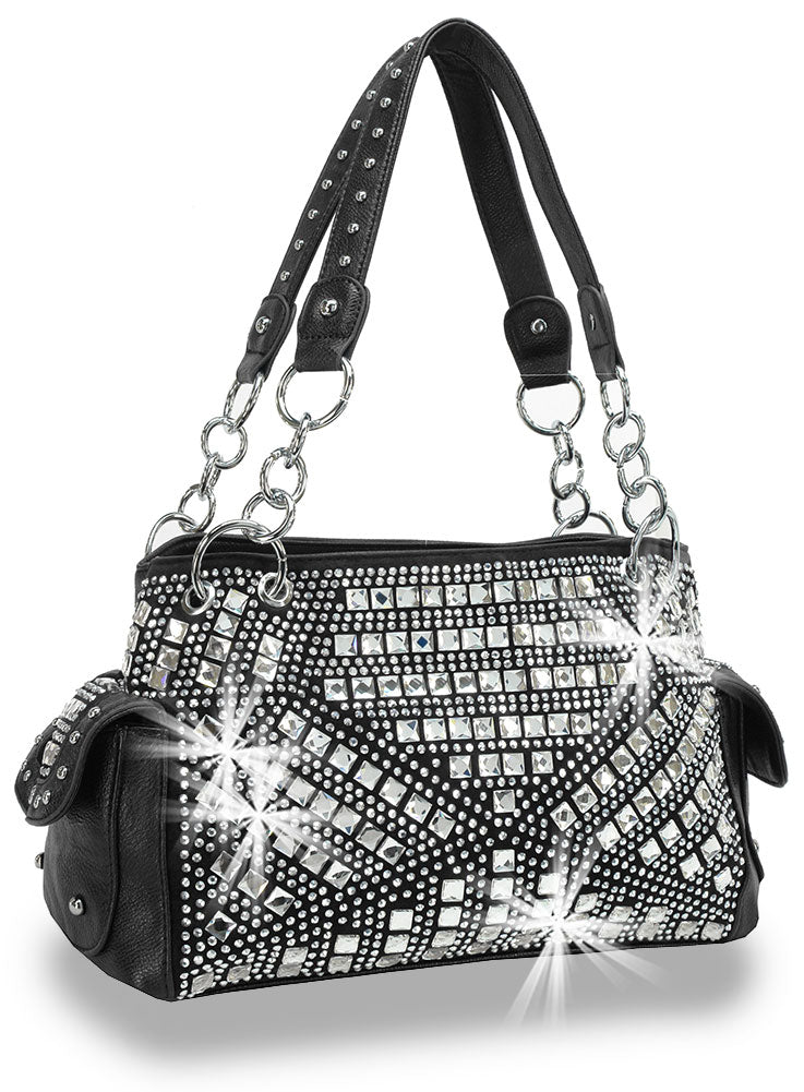 The Rhinestone Covered Fashion Handbag is a black faux leather shoulder bag, embellished with silver rhinestones in swirling patterns, featuring chain-link handles with studded details and side pockets with snap closures.