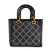 The Colored Stone Grid Pattern Tote Handbag features a small, elegant black faux leather design with a diamond grid pattern, gold ring accents, two sturdy handles, and a sophisticated structured shape.
