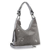 The Rhinestone Accented Hobo Handbag features a silver faux leather finish, sparkling rhinestones, a curved top, zipper closure, matching shoulder strap, and detachable crossbody strap for a glamorous look.