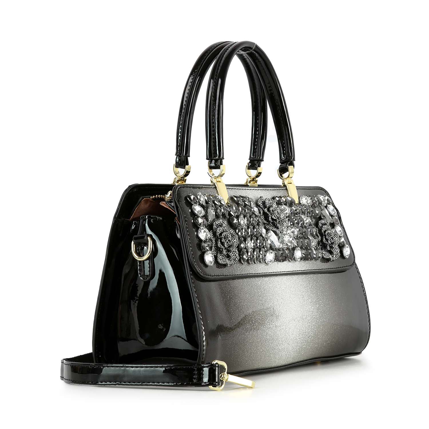 The Sparkling Patent Decorative Hand Tote features glossy black faux leather, two handles, gold hardware, a detachable shoulder strap, and a front panel adorned with beautiful silver crystal accents.