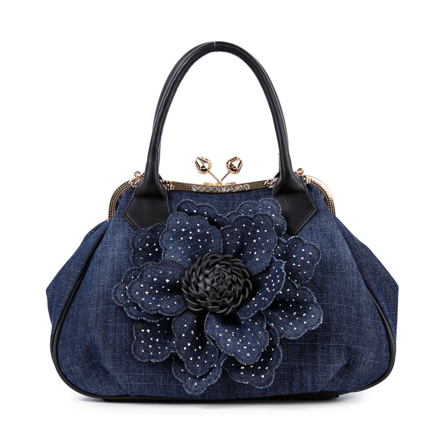The Raised Flower Metal Frame Hand Tote is a dark blue denim handbag with black handles and a front flower accent featuring silver studs and a woven center—a true vintage-chic accessory.