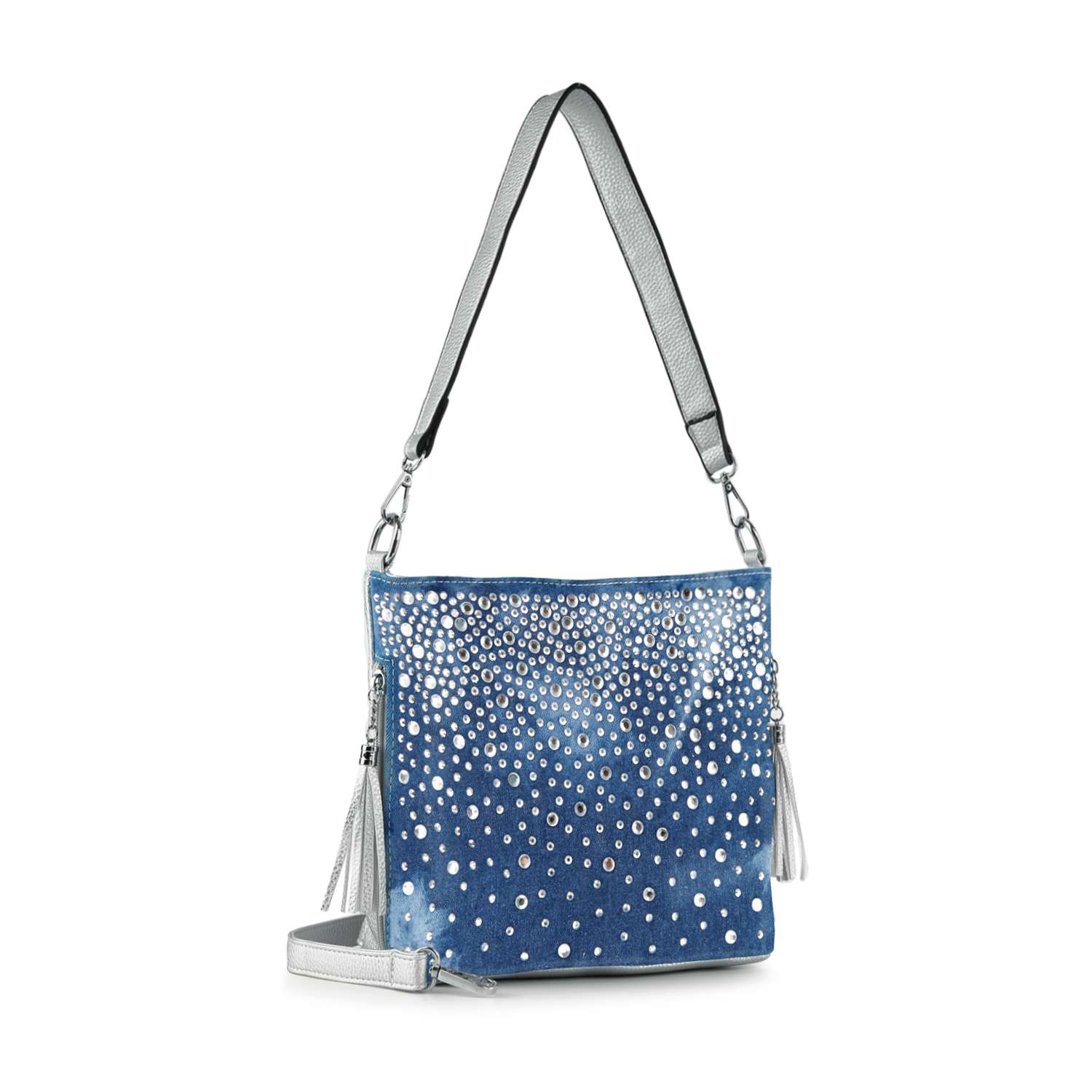 The Glamorous Rhinestone Hobo Crossbody Sling is a blue denim bag with ombre rhinestone studs, a silver adjustable faux leather shoulder strap, and two side tassels, shown against a white background.