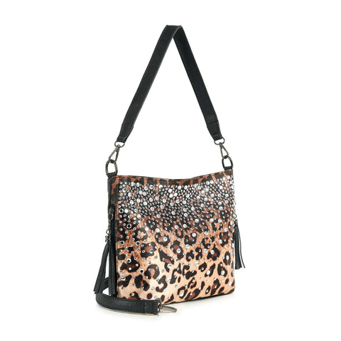 The Glamorous Rhinestone Hobo Crossbody Sling is a medium hobo bag in leopard-print faux leather with a black strap, ombre rhinestones, silver studs and upper rhinestone detail, plus black tassels on each side.