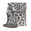 The Rhinestone Bling Petite Crossbody Sling features a black and silver leopard print with sparkling rhinestones, silver grommets, and a chain strap interwoven with black for chic, standout style.