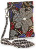 The Colorful Rhinestone Petite Crossbody Sling is a small faux leather bag with a silver chain strap, featuring a large rhinestone flower and red, blue, and gold rhinestone accents—perfect for any occasion.