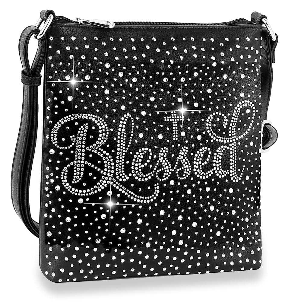 The Blessed Rhinestone Crossbody Sling is a black faux leather bag with silver studs, a rhinestone pattern, and the word Blessed in sparkling cursive accents.