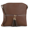 The Tassel Accented Crossbody Sling is a lightweight brown faux leather bag with a gold front zipper, two decorative tassels, an adjustable strap, and a simple, elegant design.