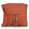 The Tassel Accented Crossbody Sling is a brown faux leather bag with a gold zipper, two matching tassels, an adjustable strap, and a smooth, structured design.