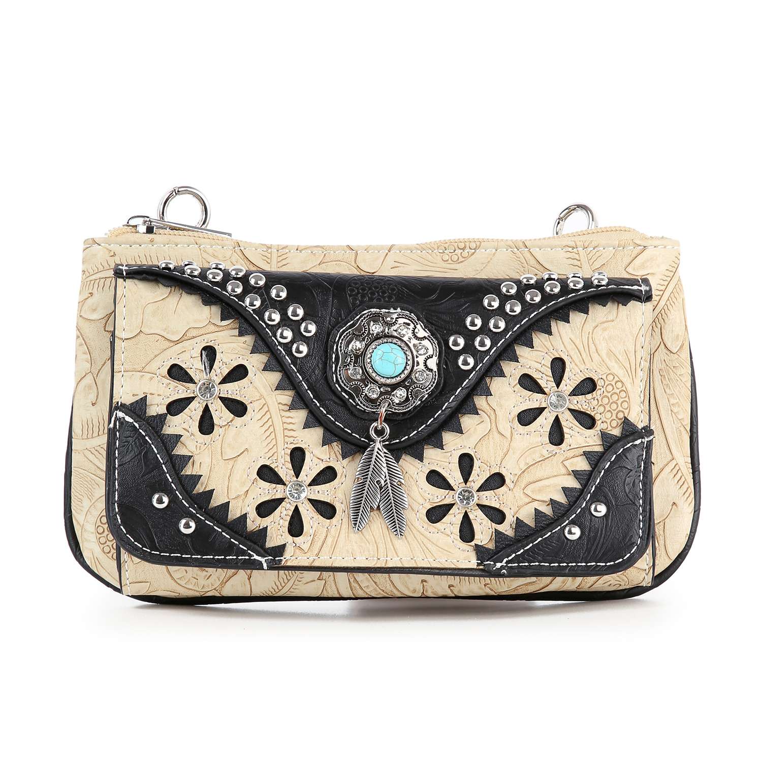 The Western Design Petite Crossbody Sling features beige faux leather, black floral cutouts, silver studs, a turquoise stone accent, and a silver feather charm—a stylish western bag for any occasion.