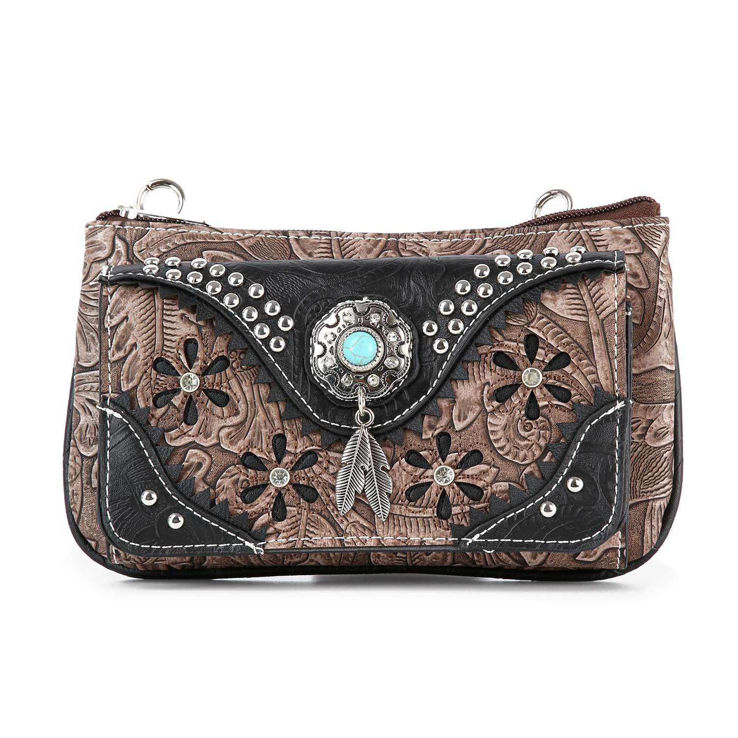 The Western Design Petite Crossbody Sling features a brown embossed finish, black accents, silver studs, floral cutouts, a central turquoise stone with metal detailing, and two feather charms.