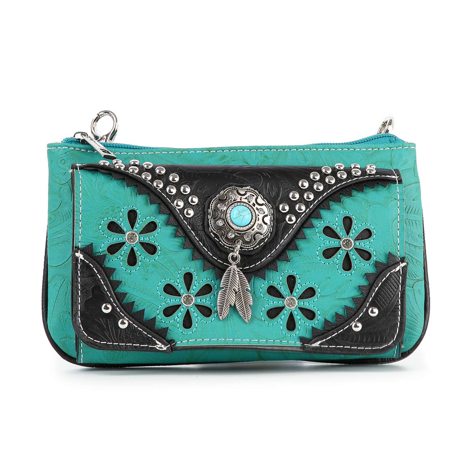 The Western Design Petite Crossbody Sling features turquoise and black faux leather, floral cutouts, silver studs, a central turquoise stone, and a silver feather charm on the front.