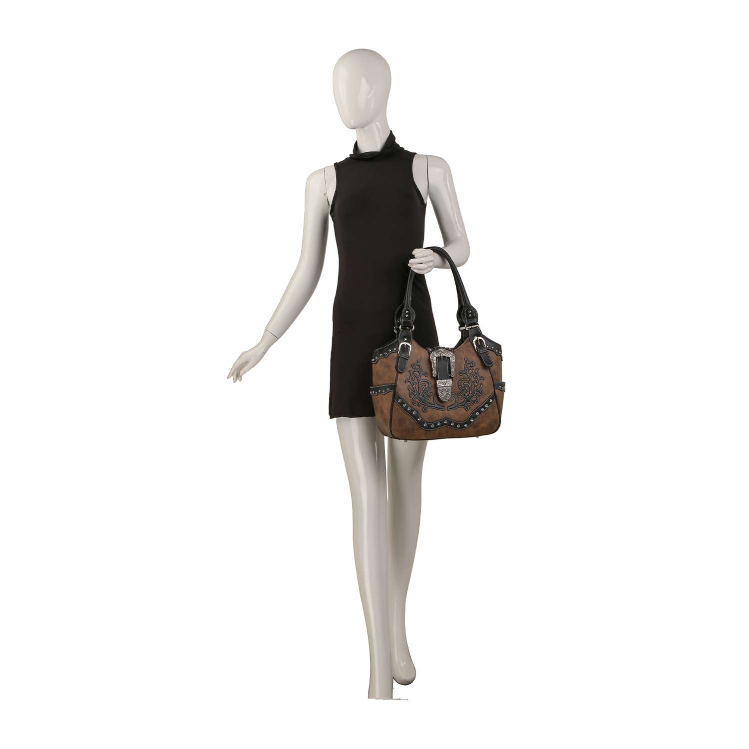 A mannequin in a sleeveless black dress poses with the Western Design Embroidered Shoulder Bag, featuring decorative studs, against a plain white background.
