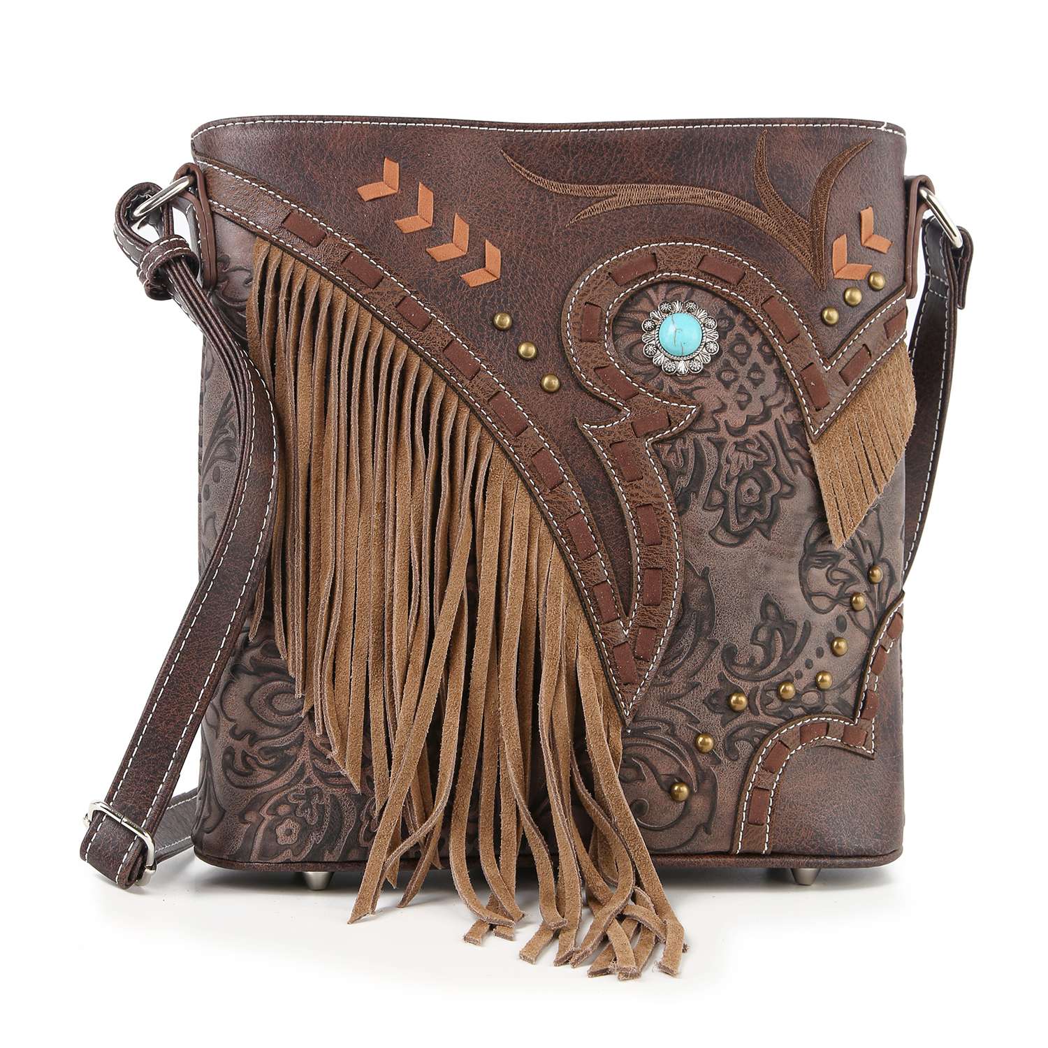 The Western Fringe Design Crossbody Sling features tooled floral patterns, tan suede fringe, decorative studs, and a turquoise stone accent. Made of faux leather, it has an adjustable strap and classic western-style details.