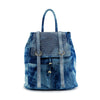 The Rhinestone Accent Fashion Backpack features a blue denim tie-dye design, two front pockets, silver studs and grommets on the flap, plus a top handle and drawstring closure for style and convenience.