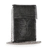 The Rhinestone Metal Mesh Cell Phone Crossbody is a small black bag with a flap closure, silver-tone hardware, sparkling rhinestones, and a long chain strap, displayed on the surface below it.