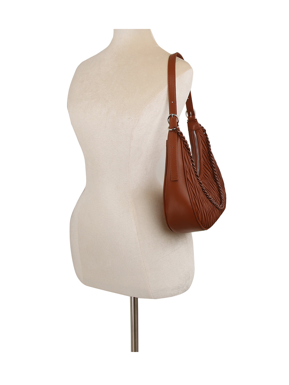 A Chain Accented Gathered Hobo Handbag in brown faux leather with braided side details and an adjustable strap is shown on a beige dress form mannequin against a white background.