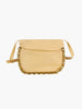 The Chain Accented Front Flap Shoulder Bag features light beige faux leather, a flap closure, gold-toned chain accents along the front edge, and a matching adjustable shoulder strap, shown against a plain white background.