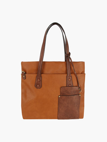 The Two Toned Tall Tote Handbag is a tan faux leather tote with two handles, a top zip closure, and an attached brown pouch. Tablet compatible and stylish, it’s perfect for everyday use. Shown against a plain white background.