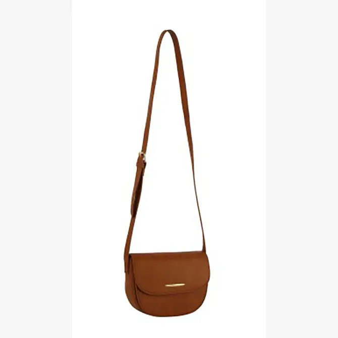 The Top Flap Petite Crossbody Bag is a brown faux leather bag with an adjustable strap, front flap closure, and a small rectangular gold-toned accent on the flap.