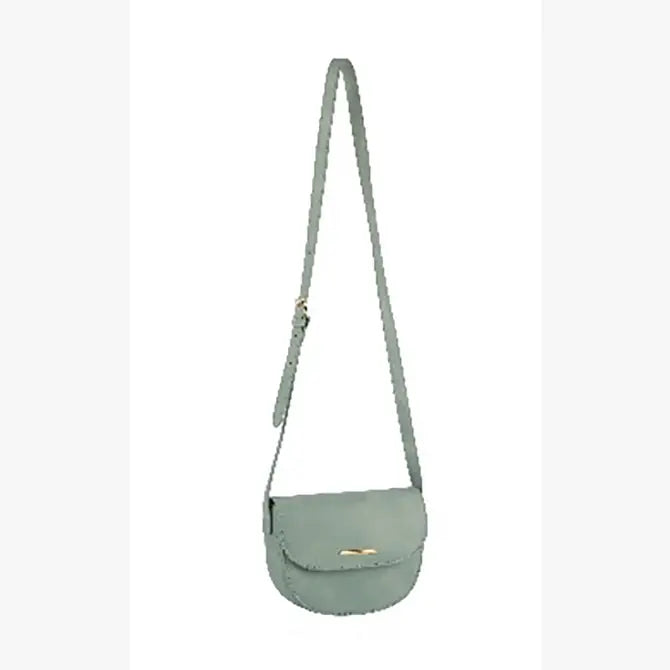 The Top Flap Petite Crossbody Bag is a light green faux leather bag with an adjustable strap and rounded flap secured by a small gold clasp, shown against a plain white background.