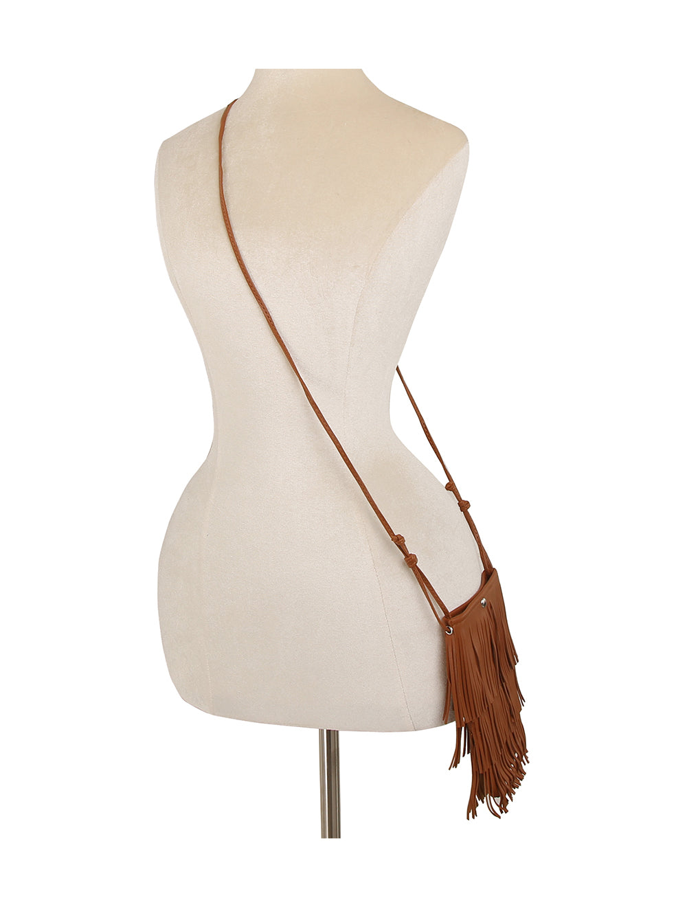 The Layered Fringe Shoulder Bag, a brown faux leather crossbody with a single strap, is draped over the shoulder of a beige dress mannequin and viewed from the back on a white background.