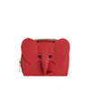 The Zip Around Elephant Wallet is a small red faux leather coin purse with large ears, a trunk, black button eyes, and a top zip closure, designed to look like an elephant.