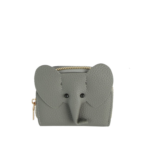 The Zip Around Elephant Wallet is a compact gray faux leather wallet featuring an elephant face with ear-shaped flaps, a long trunk detail, black button eyes, and a gold-toned zip closure.