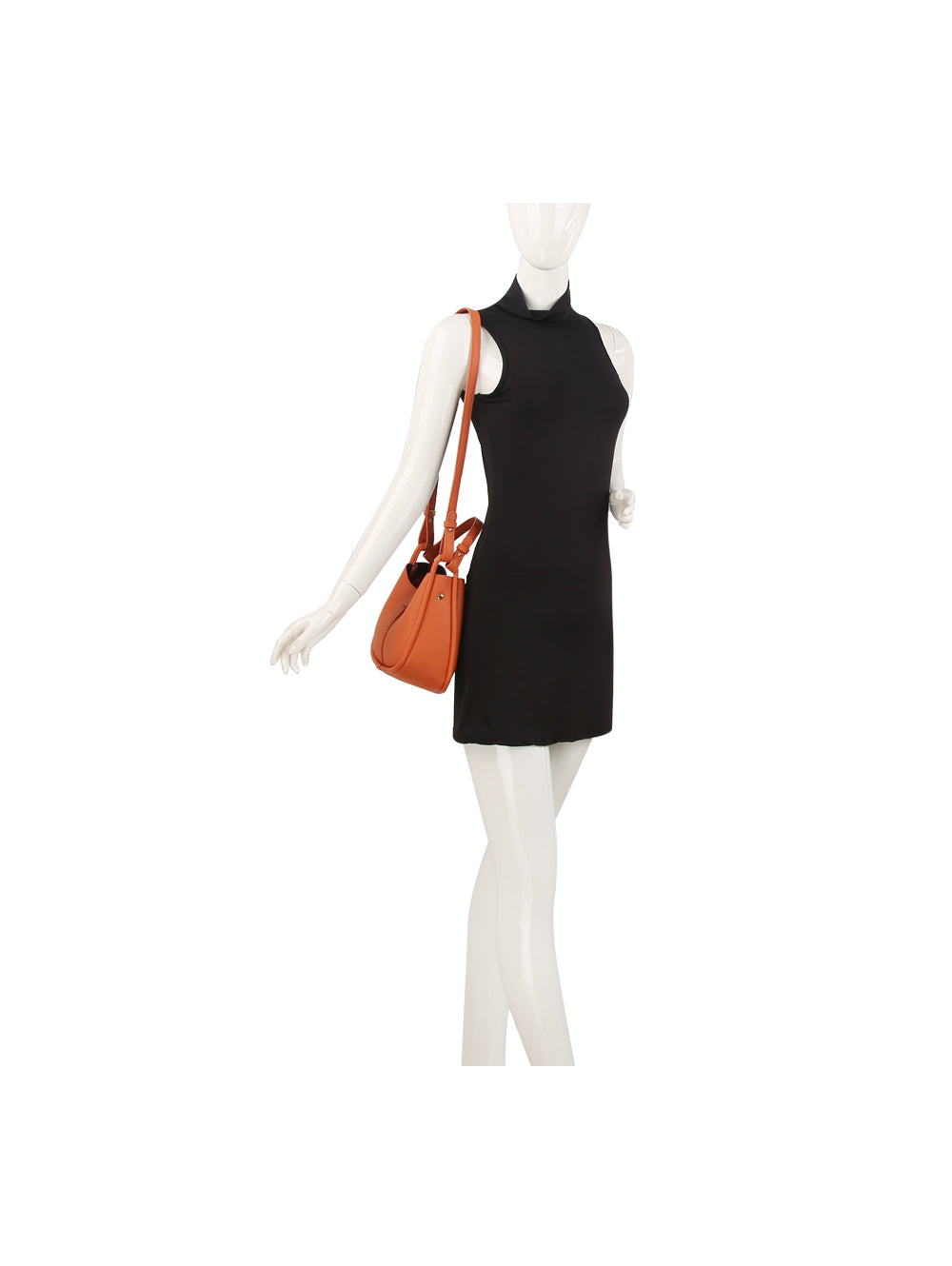 A mannequin poses with a Faux Leather Shoulder Bag featuring a detachable strap, slung over its shoulder, paired with a sleeveless black mini dress against a plain white background.