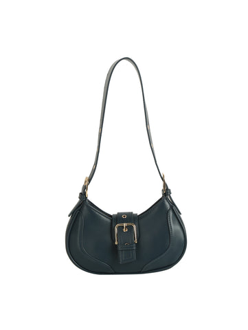 The Buckle Accented Petite Shoulder Bag is a black faux leather shoulder bag with a curved shape, adjustable strap, and large gold buckle on the front flap, shown against a white background.