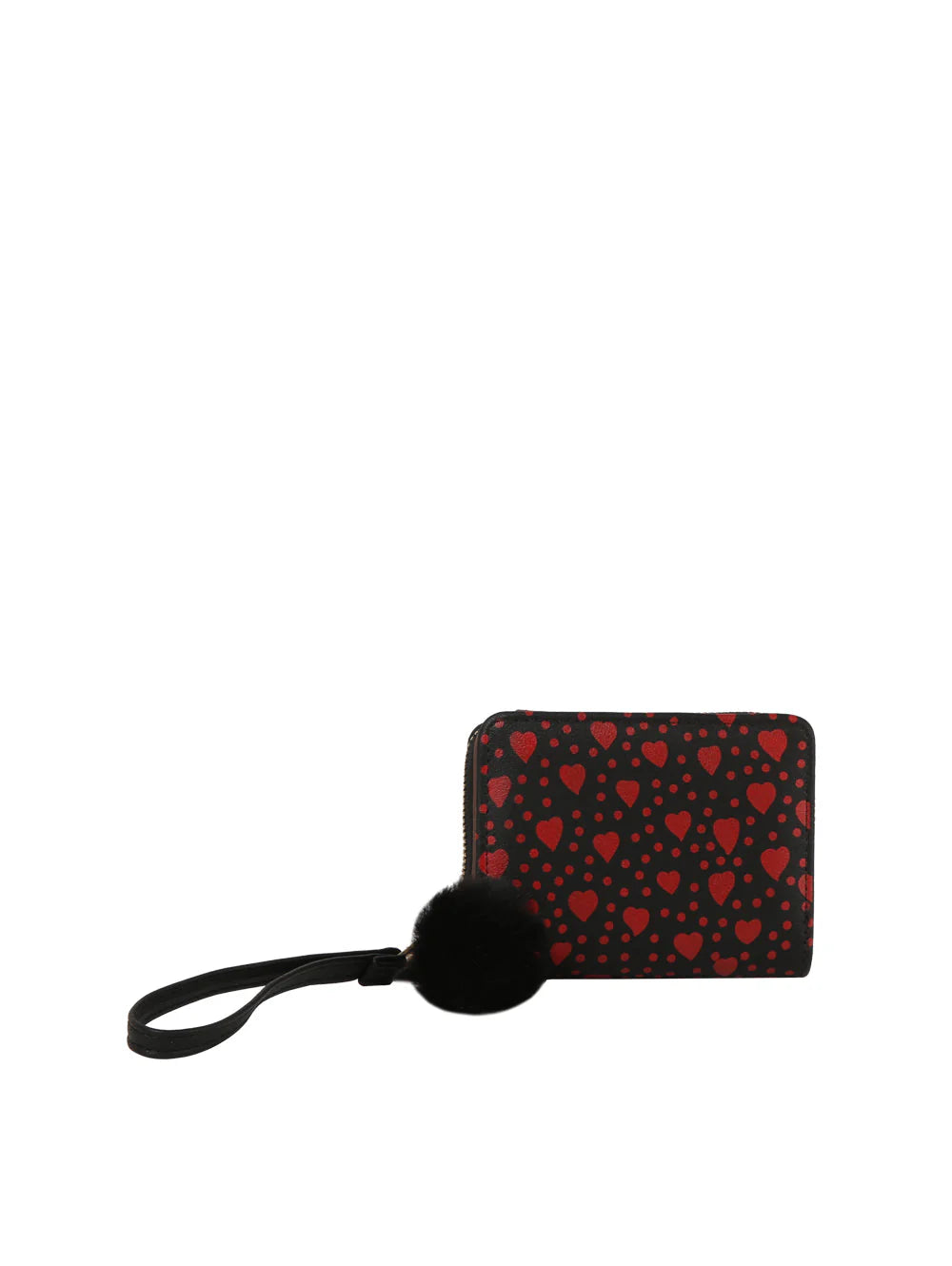 The Dainty Heart Print Petite Wristlet Wallet features black faux leather, card slots, a red heart pattern, a black wristlet strap, and a black fluffy pom-pom keychain, all displayed against a white background.