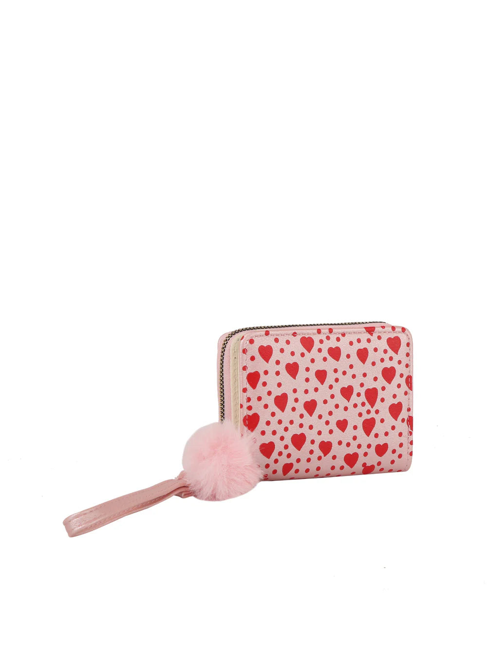 The Dainty Heart Print Petite Wristlet Wallet features white faux leather with pink and red heart patterns, a pink zipper, a wristlet strap, and a fluffy pink pom-pom, displayed on a white background.