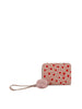 The Dainty Heart Print Petite Wristlet Wallet is a small beige faux leather wallet featuring card slots, a red heart print, a beige wristlet strap, and a pink fluffy pom-pom keychain.