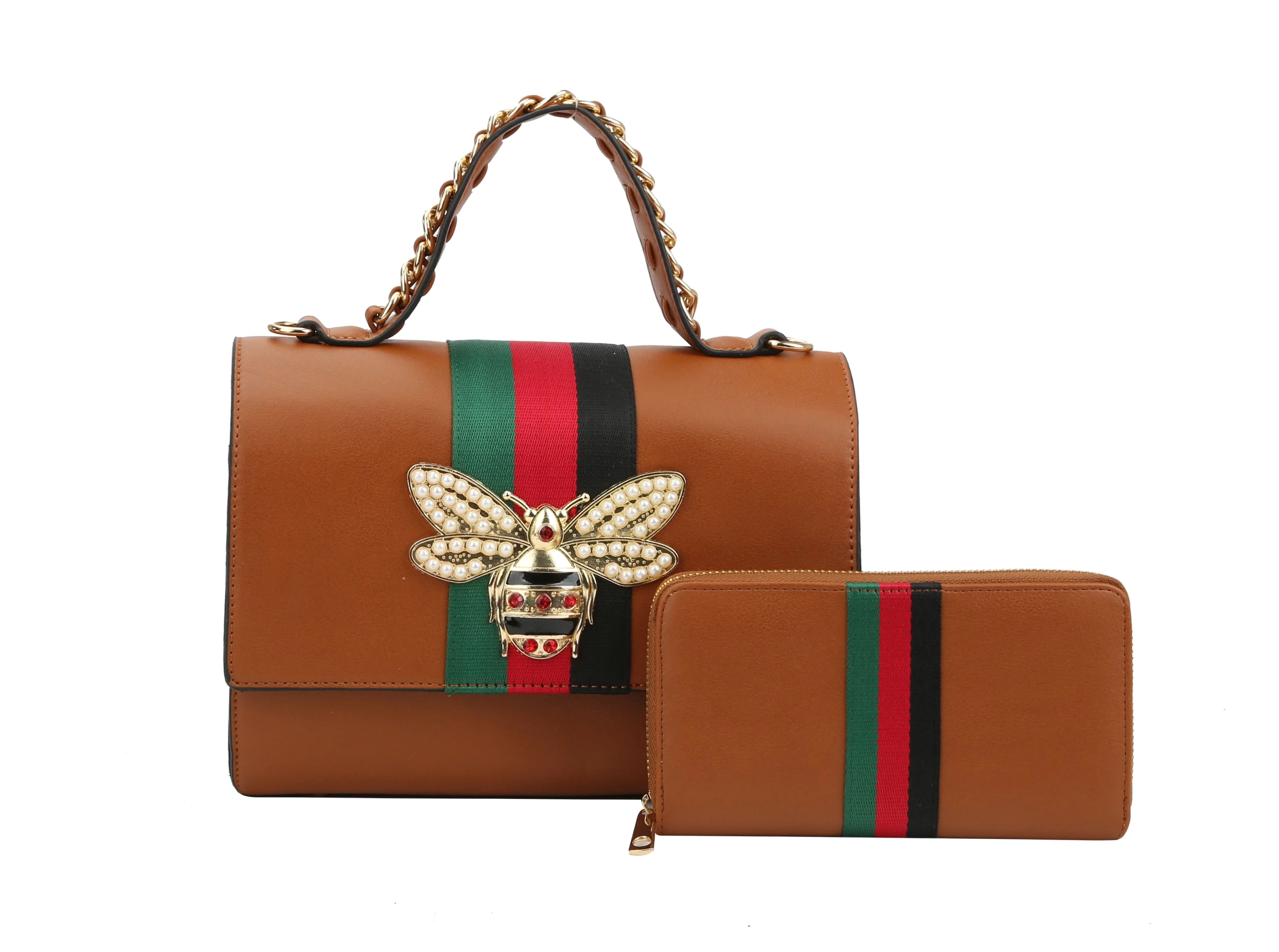 The Bee Pendant Patent Satchel Handbag Set features a brown faux leather bag with a gold bee ornament, pearl accents, gold hardware, red-green-black stripes, and includes a matching wallet with the same stripe pattern and chain handle.