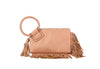 The Fringe Accented Wristlet Clutch Bag is a tan faux leather handbag featuring a circular braided handle, zip closure, gold-toned hardware, and fringe accents along the bottom and side, shown against a white background.
