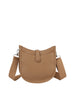 The Chic Saddle Bag Design Shoulder Bag features tan faux leather, a wide adjustable strap, front flap pocket, button and top zip closures, all displayed against a plain white background.
