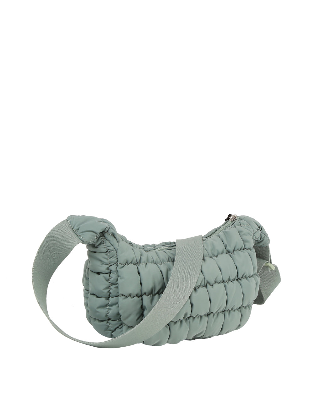 The Quilted Puffer Crossbody Hobo is a light sage green, quilted nylon bag featuring an adjustable single strap and top zip closure, shown against a white background.